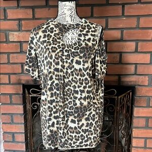 Boutique top Animal Print Top with one cold shoulder  great shape . size medium